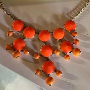 Bright shades of coral and orange J Crew statement necklace!